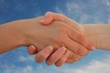 shaking hands mediation agreement
